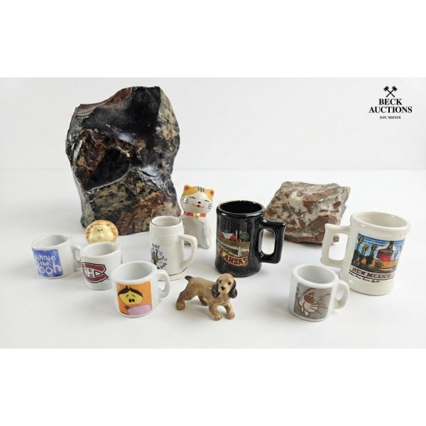 Various Miniature Douvenir Mugs And Decorative Large Piece Of Obsidian Small Dog And Cat Figures.