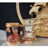 Image 3 : Decorative Nautical Lot with Resin Ship Plaque, Model Sailboat, Stein, and Coffee Mugs