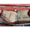 Image 4 : Blue cedar shipping trunk with a collection of burlap bags 