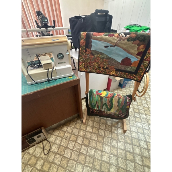  Brown Omega, sewing machine with quilt hanger, and two small handmade quilts with sewing machine ca