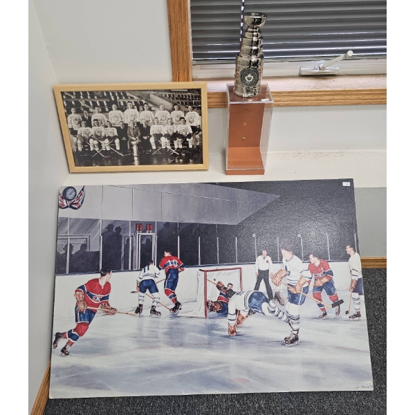 Hockey Memorabilia with Canvas, Trophy, and Historical Photo
