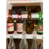 Image 2 : collection of antique bottles, including red ribbon, logger beer, Calgary beer, BC breweries from Va