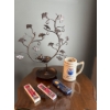 Image 1 : Metal Tabletop Tree Sculpture, Ceramics Mug, and Four Collectible Pens