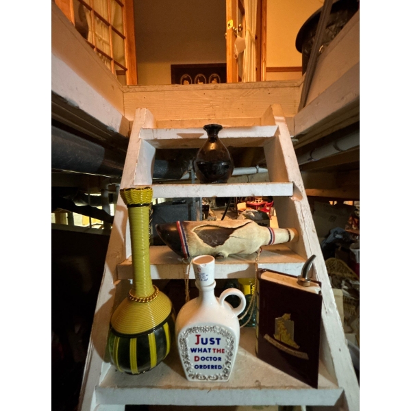 collection of four oddity liquor bottles just what the doctor ordered has a slight chip on the cork 