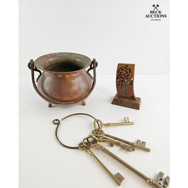  Copper cauldron, Wooden Plaque, And A Set Of Keys. 