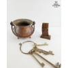 Image 1 :  Copper cauldron, Wooden Plaque, And A Set Of Keys. 
