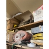 Image 3 : Top two shelves with several miscellaneous items, tools, hardhats boxes of rivets boxes of rope, air