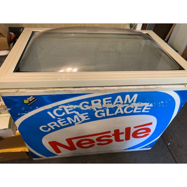 Nestle Commercial freezer in working condition 36”T, 28”W, 43”L