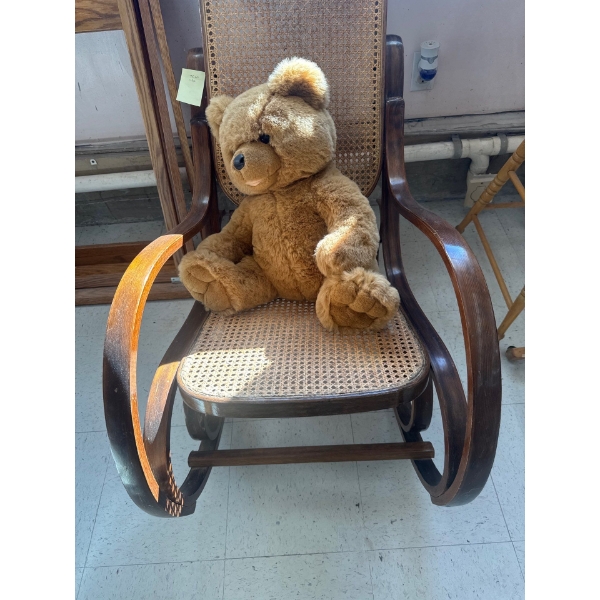 beautiful antique rocking chair, antique wood frames and adorable teddy bear