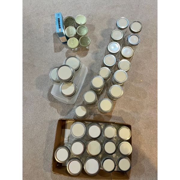 Canning jars cleaned with new lids. 6 jelly jars with new box of wax, 4 wide mouth 1 cup honey/jars 
