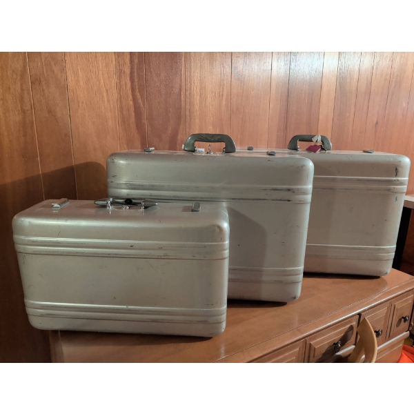 3 Halliburton Aluminum Suitcases with Burgundy Interior