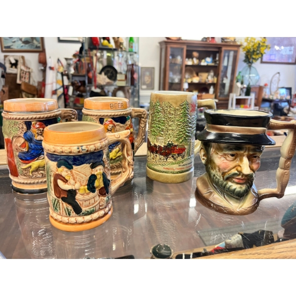 Variety of vintage beer steins. Vintage Toby Style Beard Mug Cup. Plus vintage Budweiser Champion 