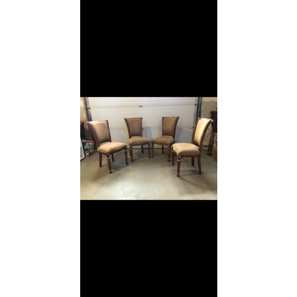 Set of 4 dining chairs in nice condition with soft padded seating surface and lovely wood legs.