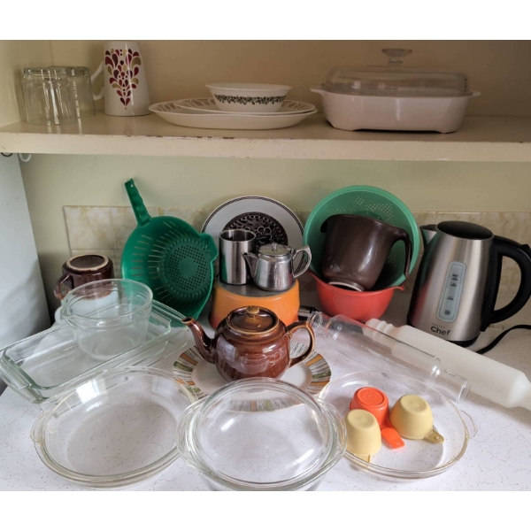 Kitchenware Lot Featuring Glass, Ceramic, and Metal Items
