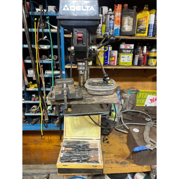 Delta drill press with several bits and vice