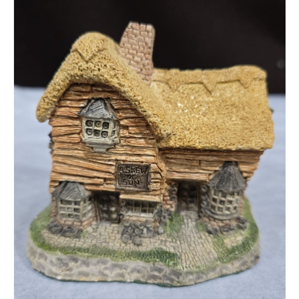 Hand Carving 'Village Shop' By David Winter 