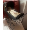 Image 1 : Antique Baby Buggy Containing A Bunting Bundle Of Joy 15T.