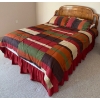 Image 1 : Wooden Queen Sized Headboard w/ Multicolored Striped Comforter & Pillows