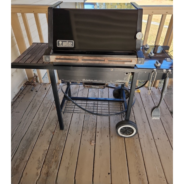 Weber Natural Gas Barbeque. Genesis 1 Model   52 w, 22 d, 45 h, Rotisserie and Basket Included