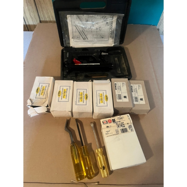 Minico air stapler, huge assortment of staples, and 3 nail pullers 

