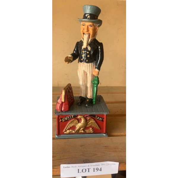 Vintage 1950's Cast Iron Penny Bank.  (Restored to working order)