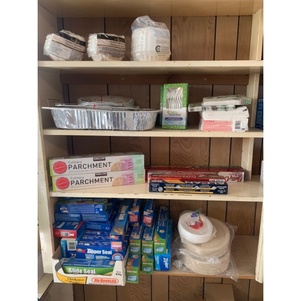 Collection of household essentials ziplock bags, plastic utensils, tinfoil, coffee filters much more