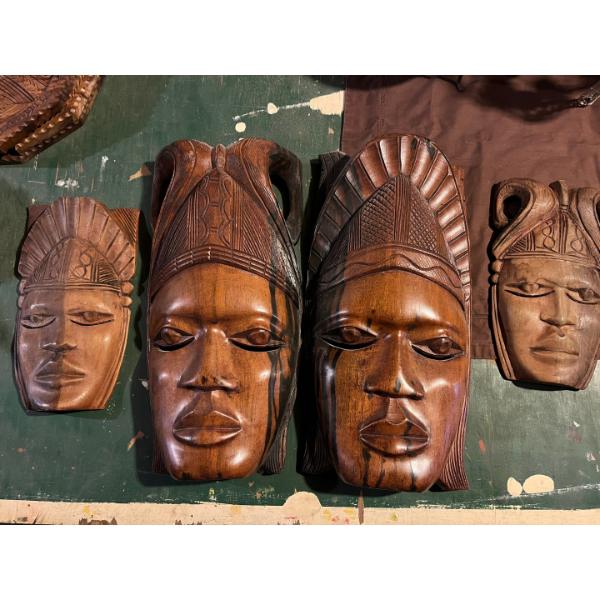  Four African masks, two large and two small ones and crafted from very nice hardwood large are 16 i