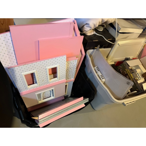 several pieces of doll house, furniture supplies, and a unassembled pink dollhouse