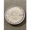 Image 1 : 1960 Canadian Silver Dollar Coin Featuring Voyageur Design
