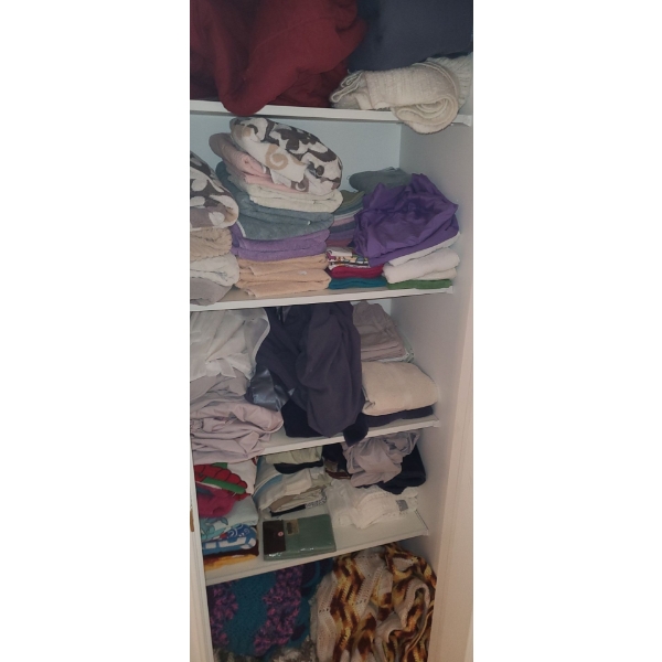 Linen Closet Contents Including: Assorted Towels and Bedding
