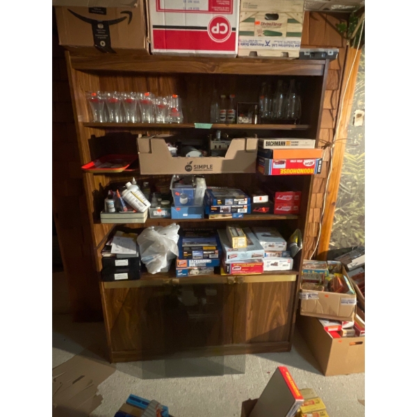 Wooden Storage Cabinet with Smoked Glass Inserts 48"x72"x15". Contents of Cabinet are NOT INCLUDED.