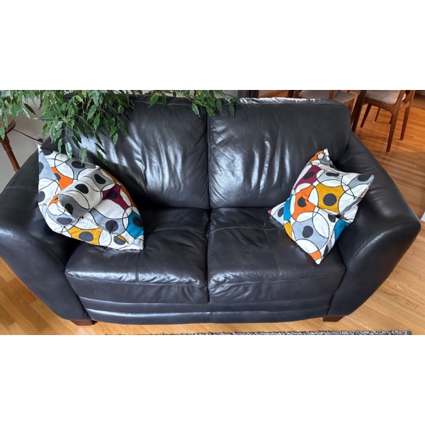 Black Loveseat w/ Cushions - 66W, 37D, 35T 