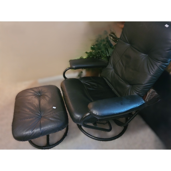 Black Leather Chair 29 W, 23 D, 38 T and Footstool 20 W, 16 D, 14 T 