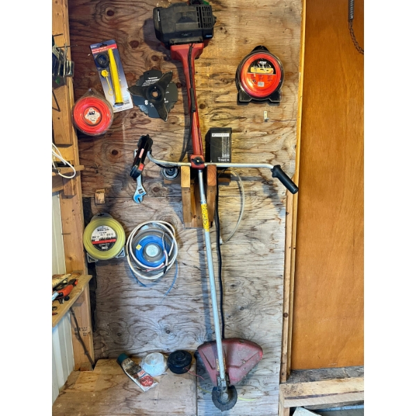 Josered gas power trimmer (works) with all the accessories on the wall.

