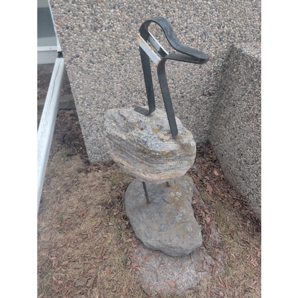 Stone and Metal Bird Sculpture with Rustic Design