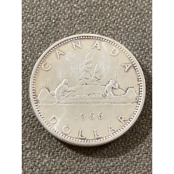 1966 Canada Silver Dollar Coin Featuring Canoe Design