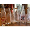 Image 3 : Atique clear soda bottles Coca-Cola wishing well whistle soda, Calgary soda and two Pepsi bottles al