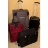 Image 1 : Four Rolling Luggage/Suitcases Fully Functionable-West Jet Bon Voyage!
