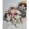 Image 1 : Assorted Dolls: "Anne" 13.5 T, Pink Dress 18.5 T, Holding Bunny 15 T, Flower Dress 24 T