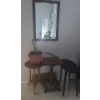 Image 1 : Tables- Oval Black: 23 W, 14 D, 23 T,  Mirror 22 X 31, Natural "Snake" Houseplant- Pot 10 X 10, 8 T