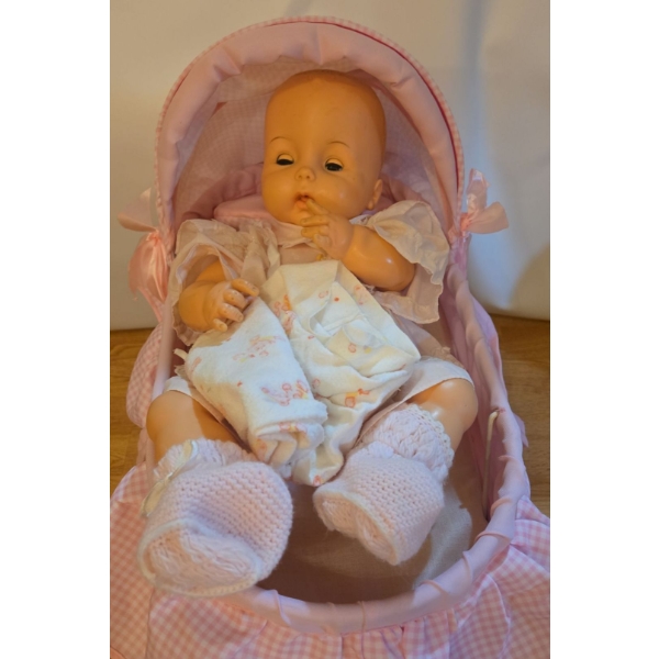 Baby Doll in Collapsible Rocking Basinet - 16W, 21D, 22T 