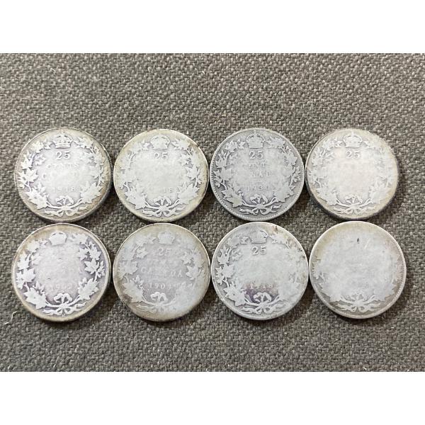 Eight Silver Canadian 25-Cent Coins Featuring George V Portrait