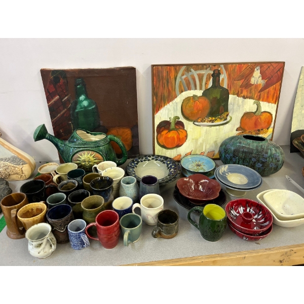 ceramic cups bowls, vases, and a couple of paintings
