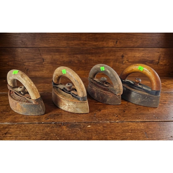 Four Vintage Cast Iron Hand Irons with Wooden Handles