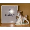 Image 1 : Lladro Dog Holding Child 2.5 W, 6 D, 5.5 T 