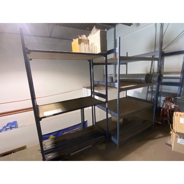 Industrial Rack with Contents, Including Pipes and Assorted Materials