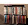 Image 12 : Extensive Collection of Entertainment Media, Including Vinyl Records, CDs, VHS, and Cassette Tapes