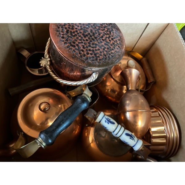 Box full of copper pots