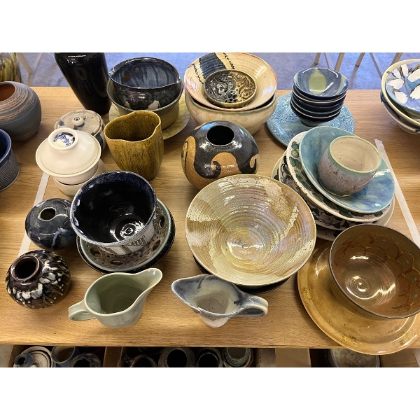 variety of ceramic pots, bowls, and vases