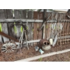 Image 2 : All backyard, decorations, saw blades, saws, antique milk, jugs, wagon, wheels, and another decorati